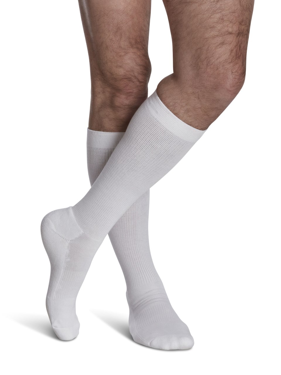 Male wearing MOTION CUSHIONED COTTON compression socks in WHITE