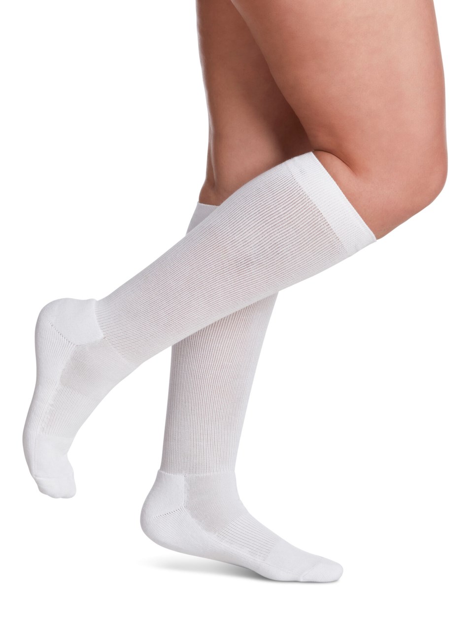 Female wearing MOTION CUSHIONED COTTON compression socks in WHITE